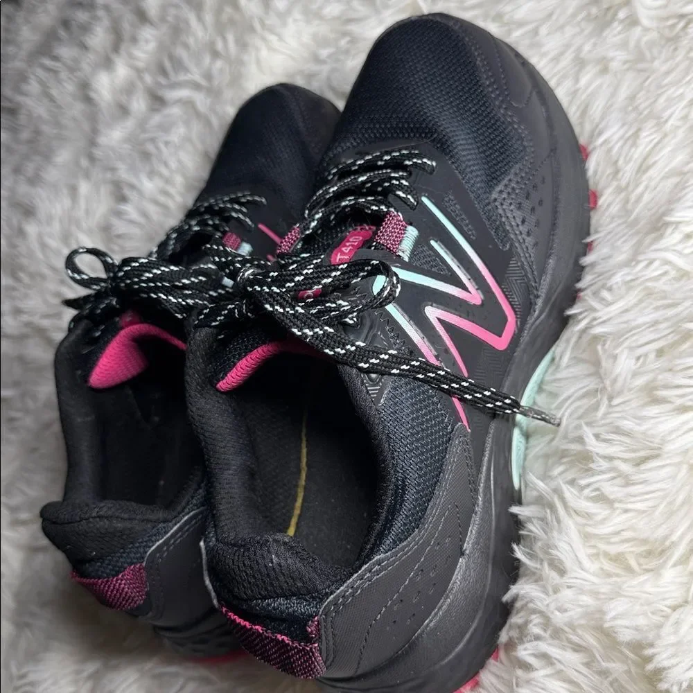 New Balance Black Sneakers with Pink Highlights